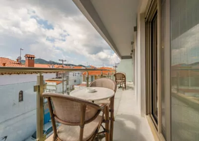 Modern luxury suite bedroom with sea view balcony at Alpha Luxury Suites Pefkohori Halkidiki