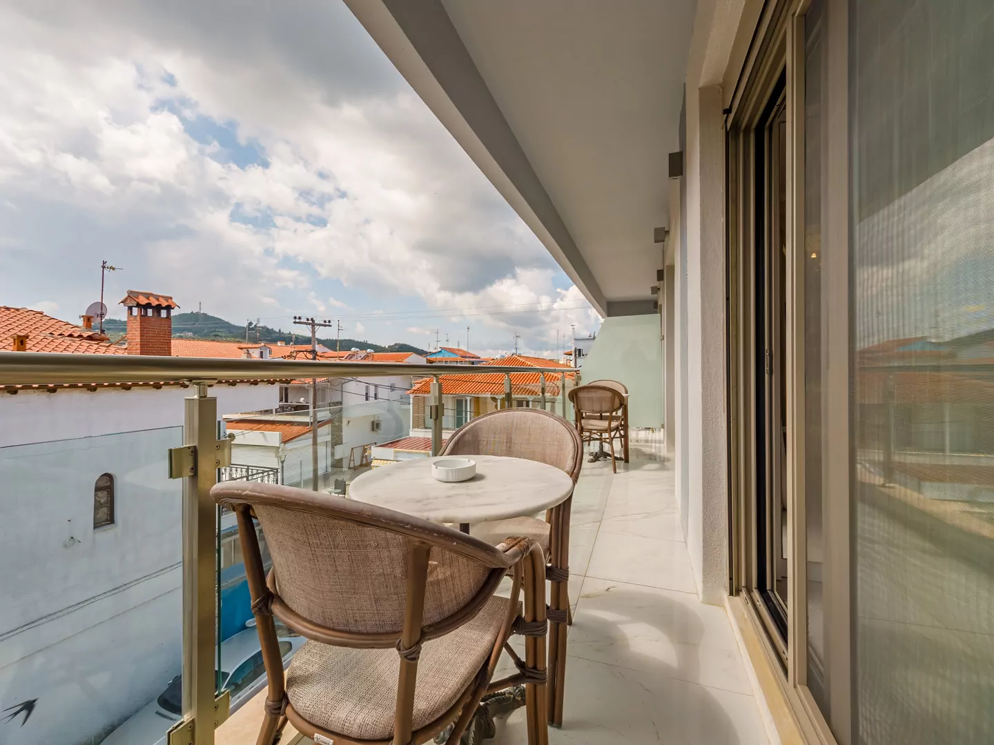 Modern luxury suite bedroom with sea view balcony at Alpha Luxury Suites Pefkohori Halkidiki