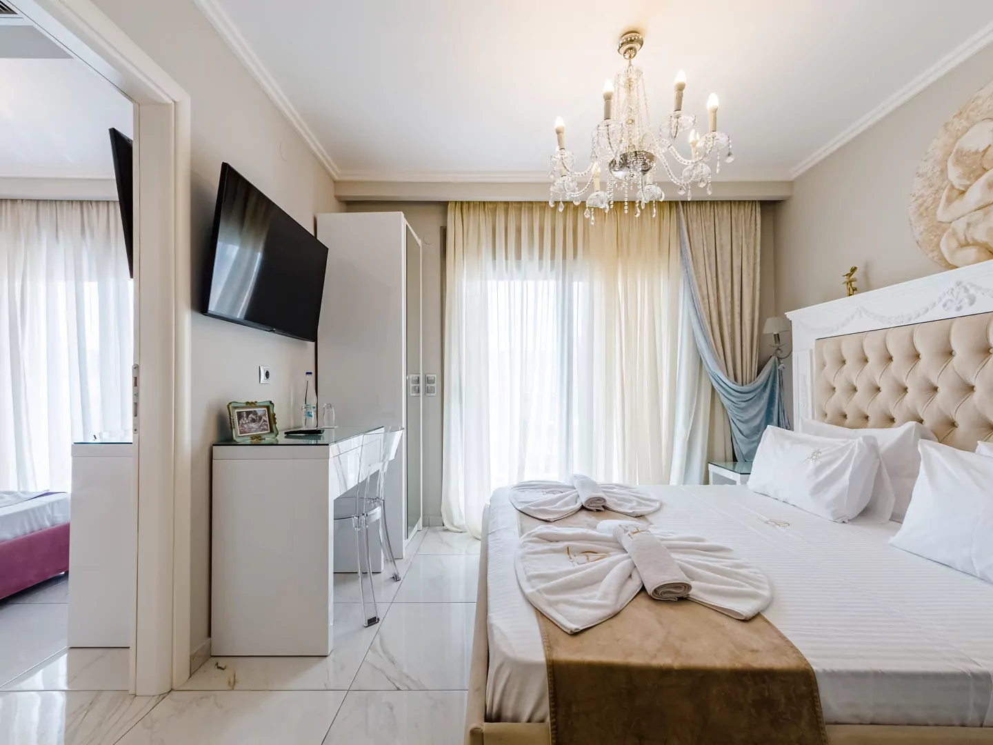 Modern luxury suite bedroom with sea view balcony at Alpha Luxury Suites Pefkohori Halkidiki