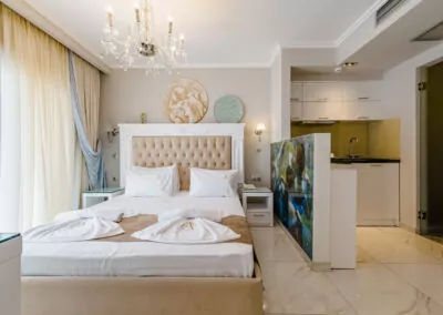 Modern luxury suite bedroom with sea view balcony at Alpha Luxury Suites Pefkohori Halkidiki