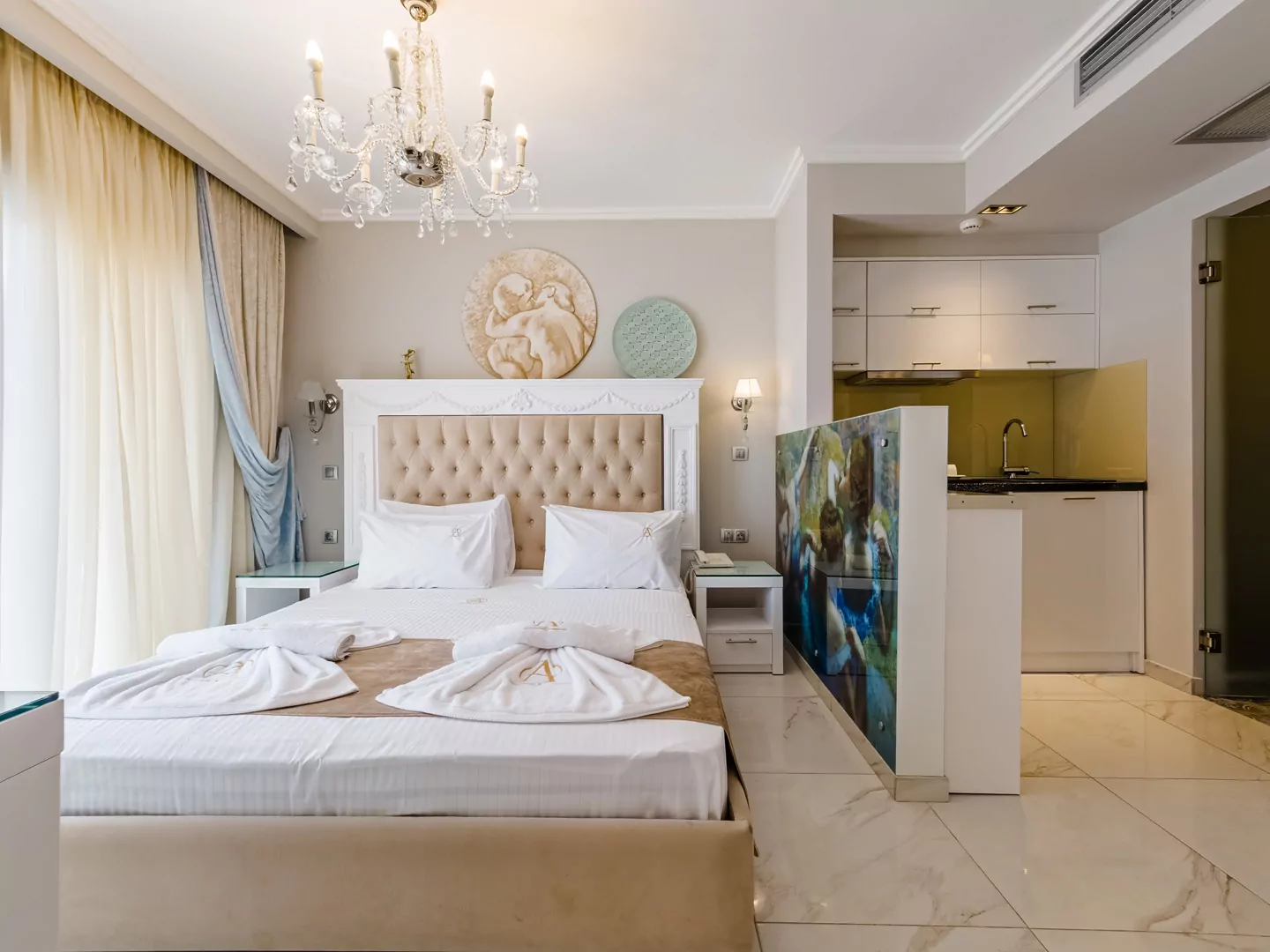 Modern luxury suite bedroom with sea view balcony at Alpha Luxury Suites Pefkohori Halkidiki