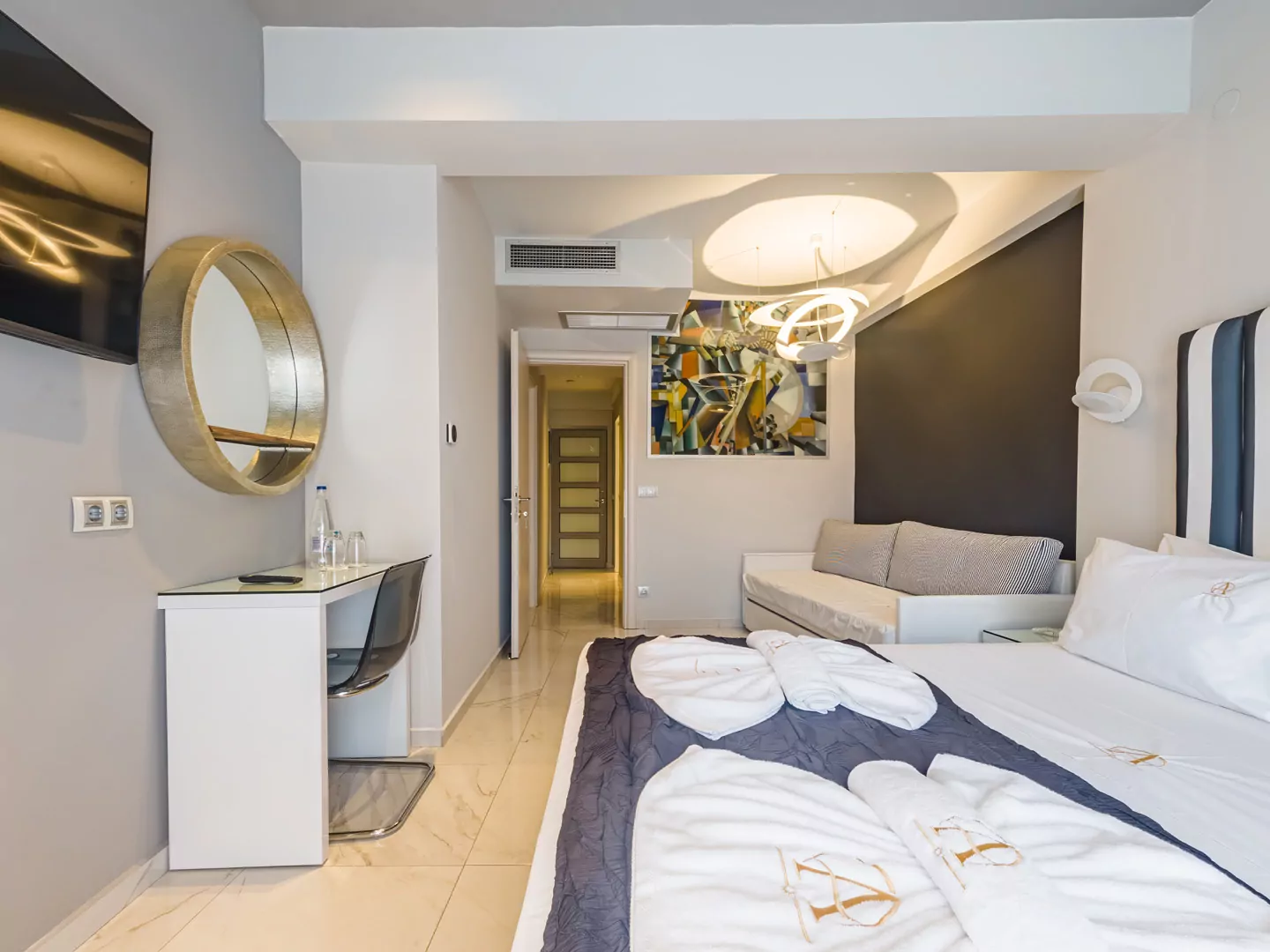 Modern luxury suite bedroom with sea view balcony at Alpha Luxury Suites Pefkohori Halkidiki