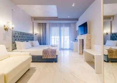 Modern luxury suite bedroom with sea view balcony at Alpha Luxury Suites Pefkohori Halkidiki