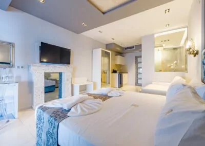 Modern luxury suite bedroom with sea view balcony at Alpha Luxury Suites Pefkohori Halkidiki