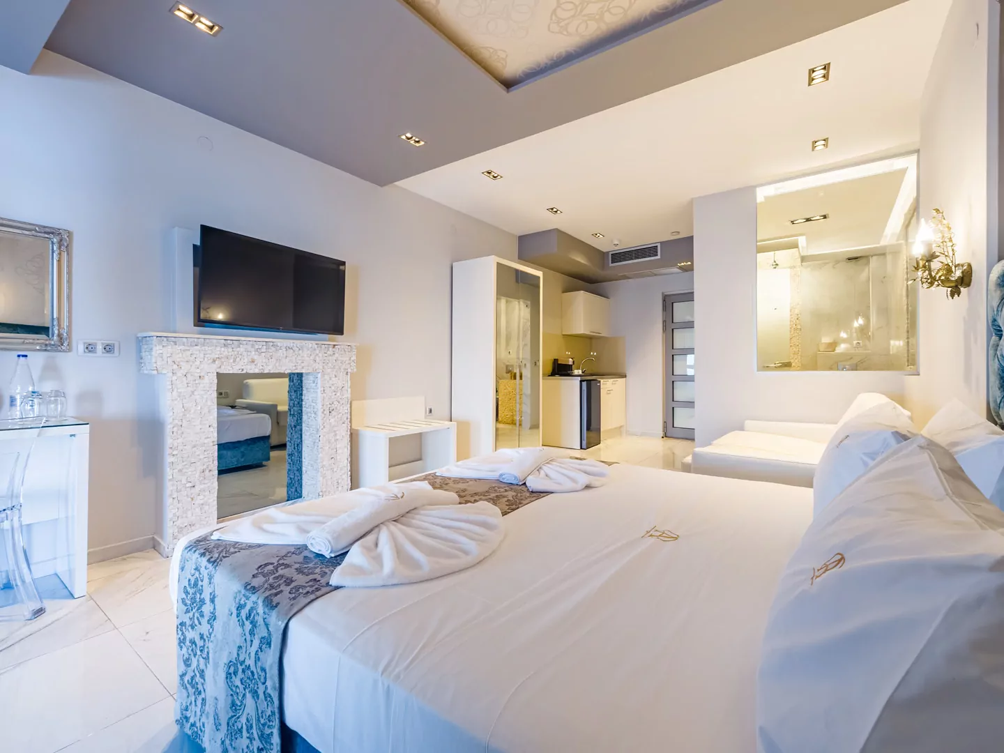 Modern luxury suite bedroom with sea view balcony at Alpha Luxury Suites Pefkohori Halkidiki