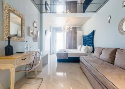 Modern luxury suite bedroom with sea view balcony at Alpha Luxury Suites Pefkohori Halkidiki