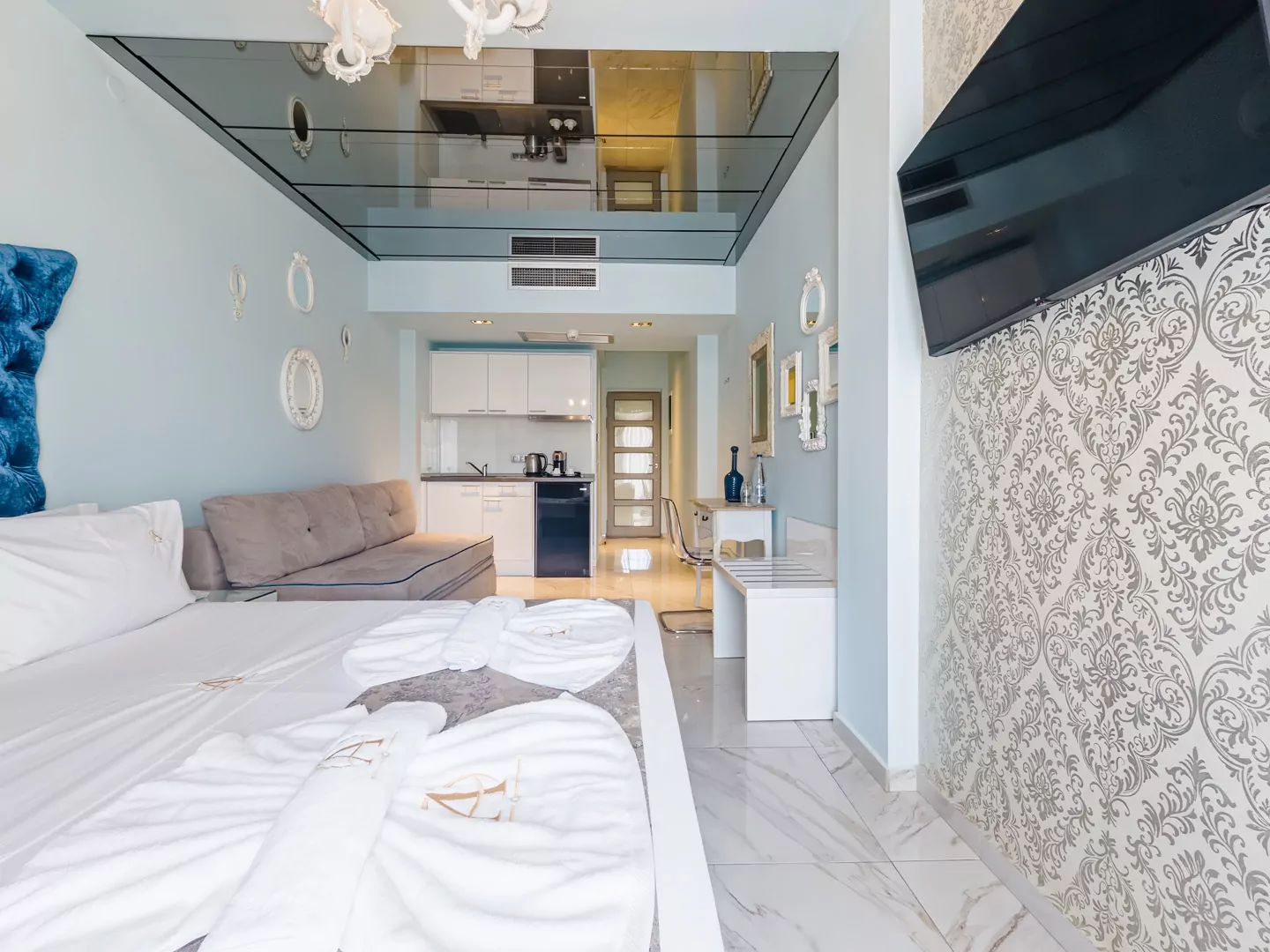 Modern luxury suite bedroom with sea view balcony at Alpha Luxury Suites Pefkohori Halkidiki