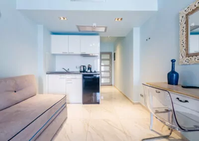 Modern luxury suite bedroom with sea view balcony at Alpha Luxury Suites Pefkohori Halkidiki