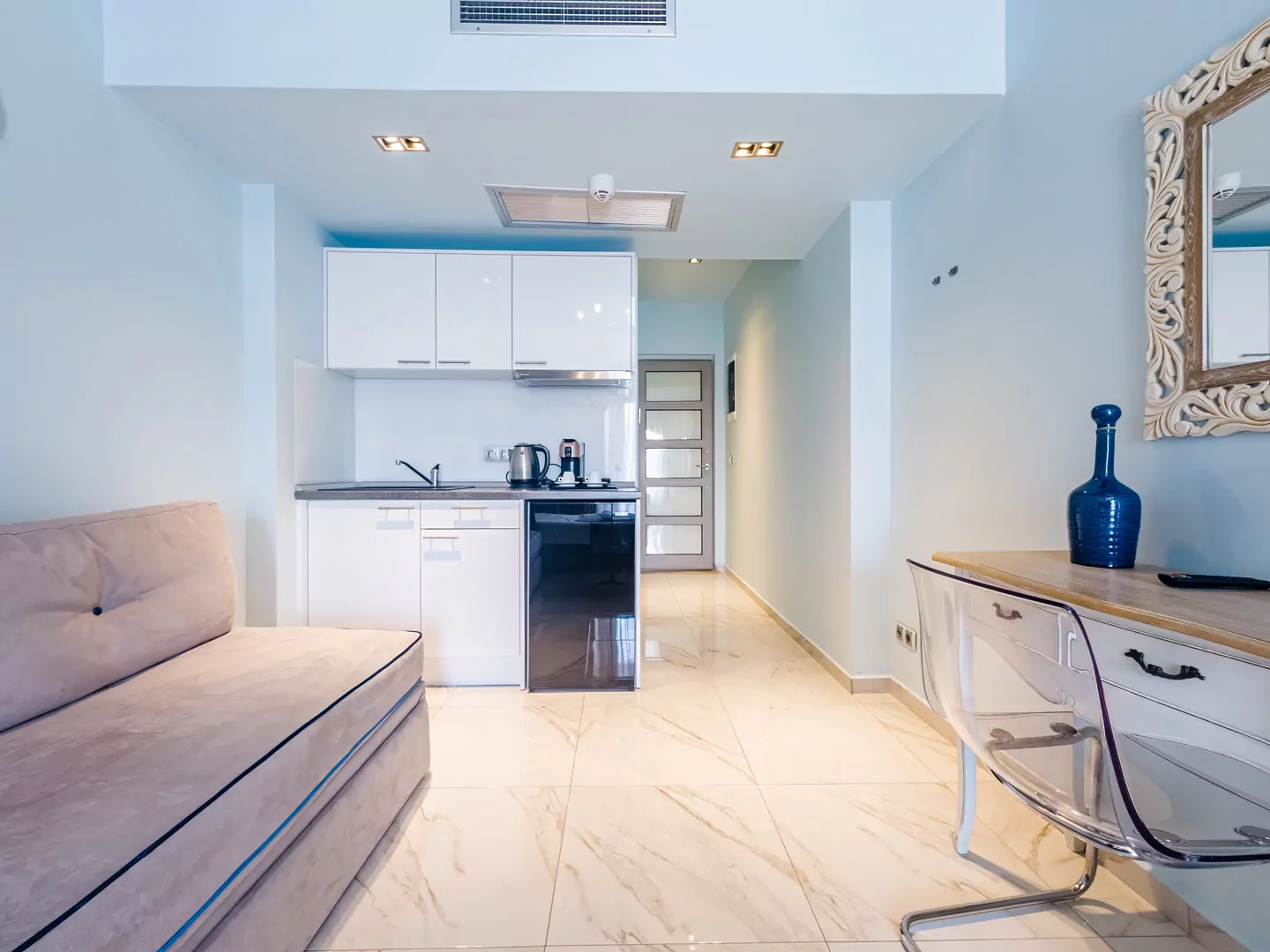 Modern luxury suite bedroom with sea view balcony at Alpha Luxury Suites Pefkohori Halkidiki