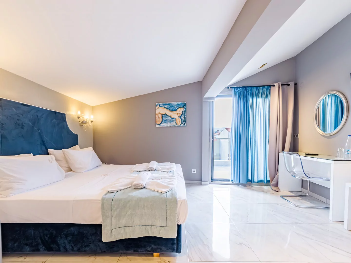 Modern luxury suite bedroom with sea view balcony at Alpha Luxury Suites Pefkohori Halkidiki