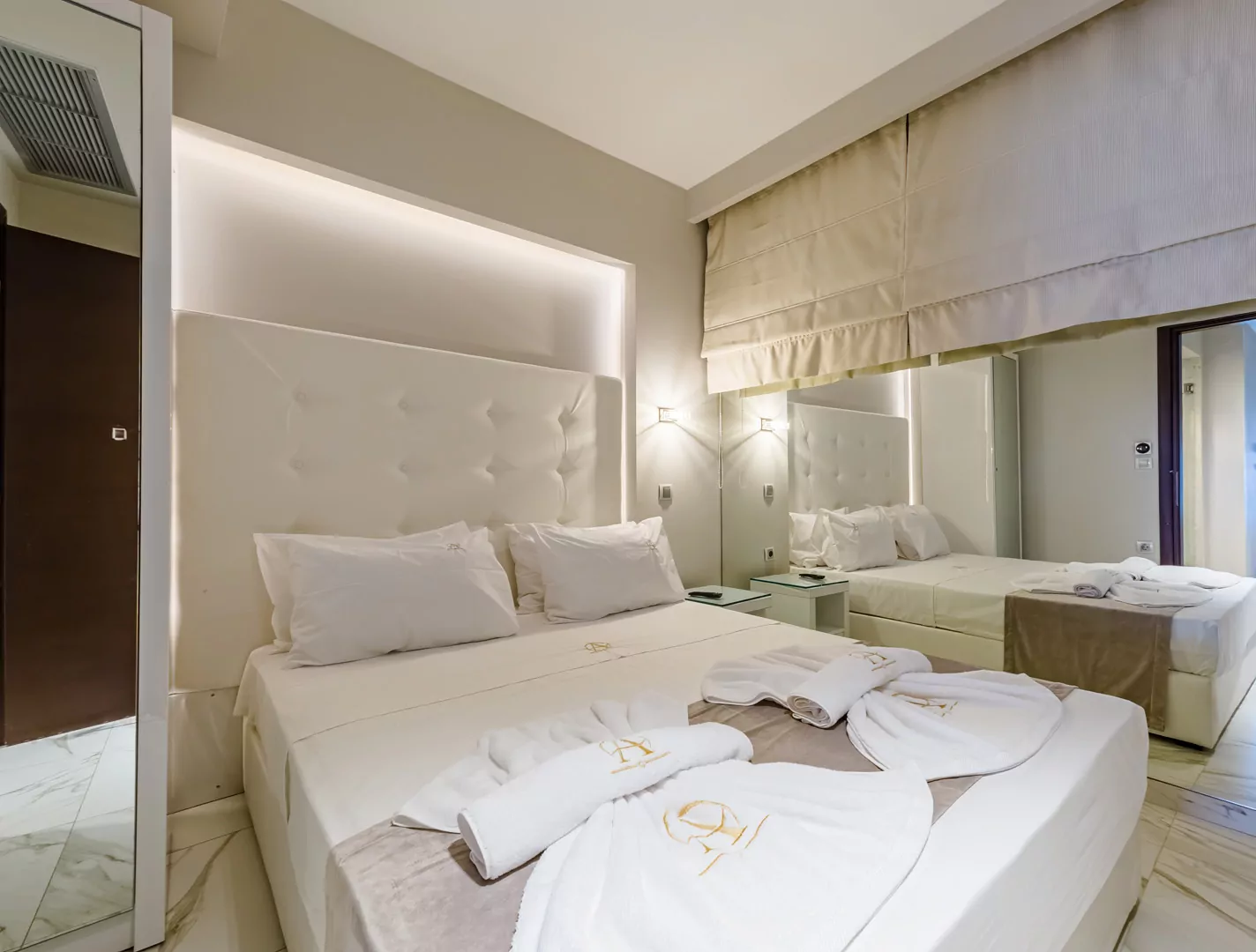 Modern luxury suite bedroom with sea view balcony at Alpha Luxury Suites Pefkohori Halkidiki