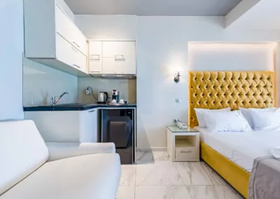 Modern luxury suite bedroom with sea view balcony at Alpha Luxury Suites Pefkohori Halkidiki
