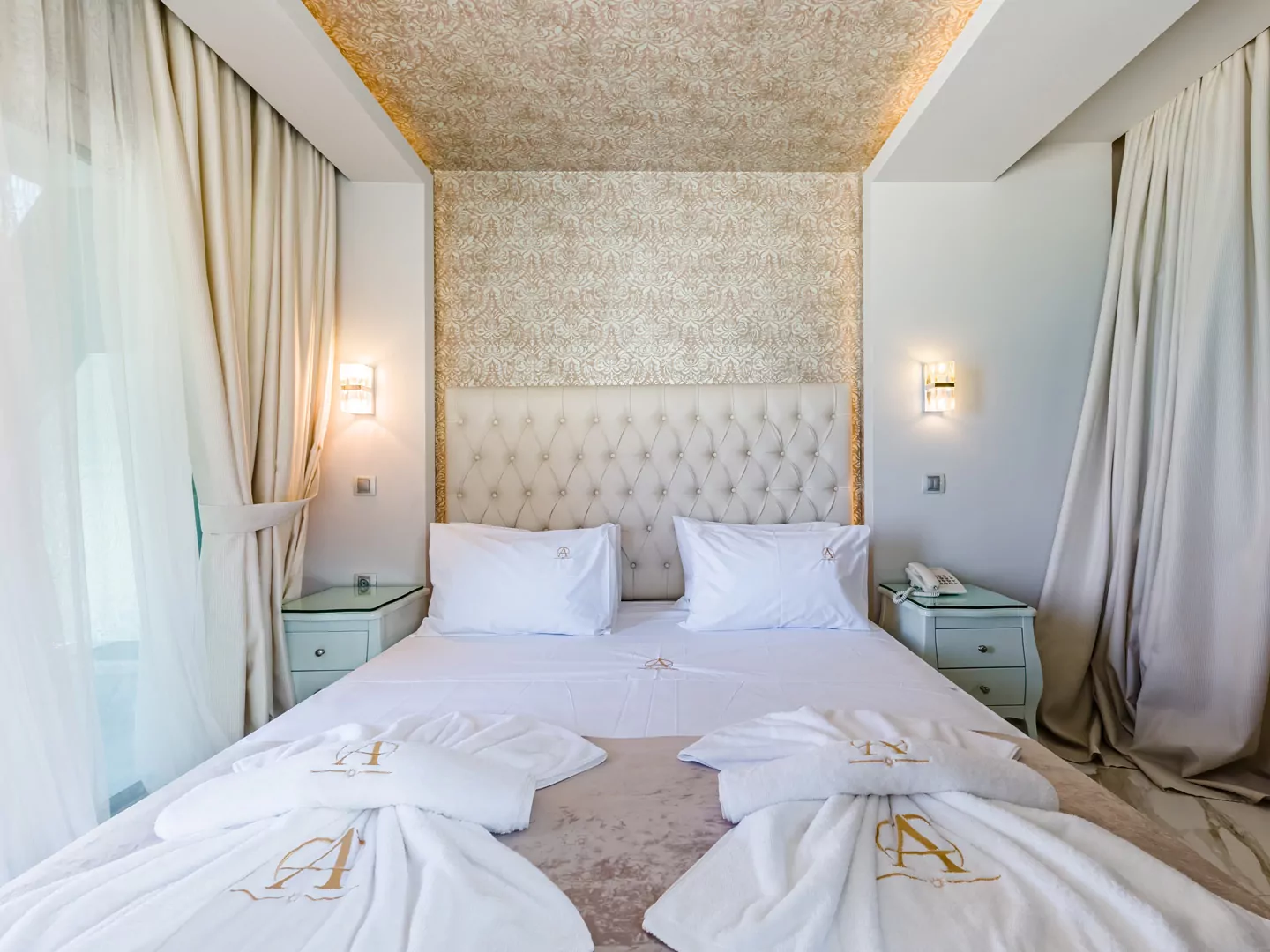 Modern luxury suite bedroom with sea view balcony at Alpha Luxury Suites Pefkohori Halkidiki