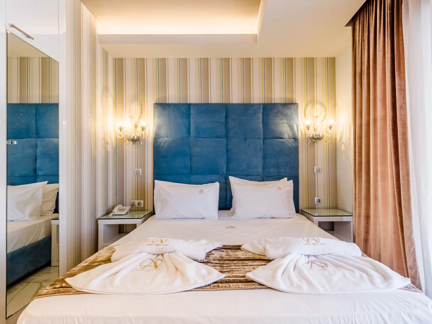 Modern luxury suite bedroom with sea view balcony at Alpha Luxury Suites Pefkohori Halkidiki