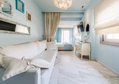 Modern luxury suite bedroom with sea view balcony at Alpha Luxury Suites Pefkohori Halkidiki