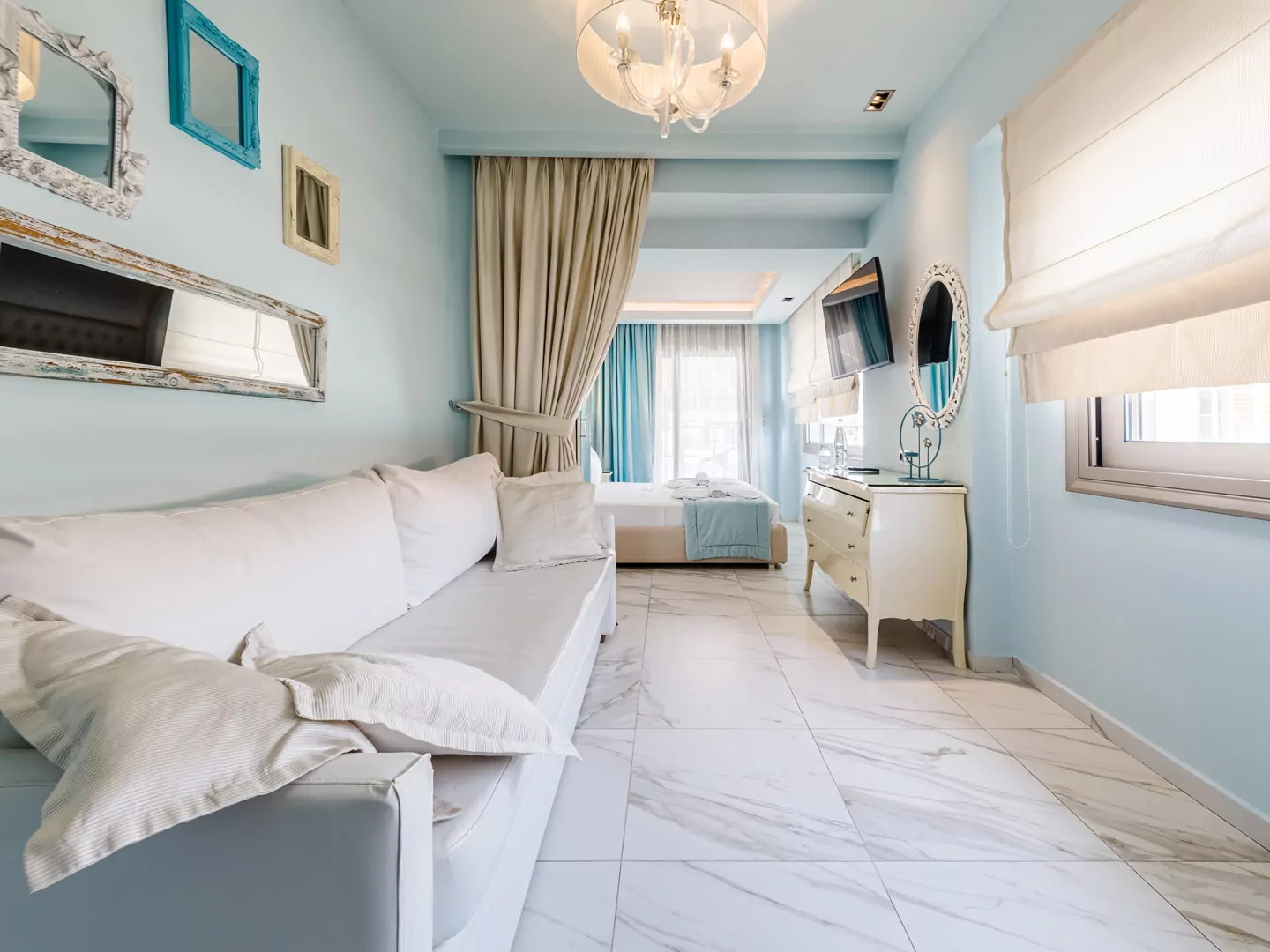 Modern luxury suite bedroom with sea view balcony at Alpha Luxury Suites Pefkohori Halkidiki