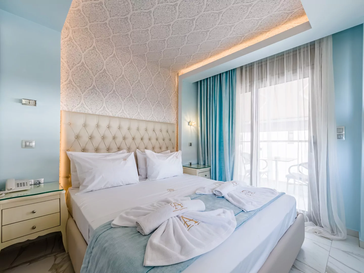Modern luxury suite bedroom with sea view balcony at Alpha Luxury Suites Pefkohori Halkidiki