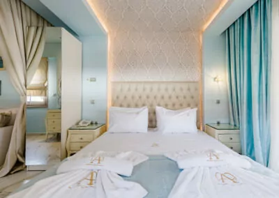 Modern luxury suite bedroom with sea view balcony at Alpha Luxury Suites Pefkohori Halkidiki