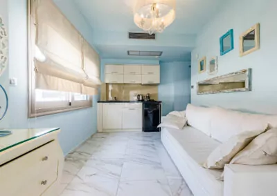 Modern luxury suite bedroom with sea view balcony at Alpha Luxury Suites Pefkohori Halkidiki