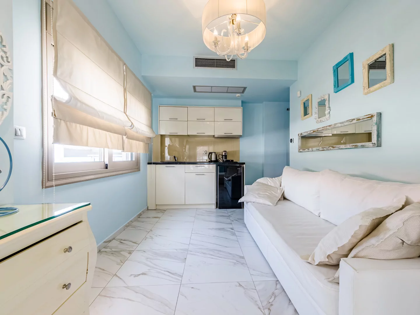 Modern luxury suite bedroom with sea view balcony at Alpha Luxury Suites Pefkohori Halkidiki